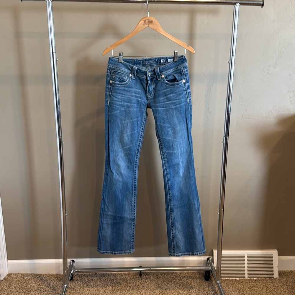 Miss Me Jeans. Size 27. 33” inseam. Holes at bottom of legs, see pictures.